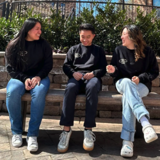 Photo of 3 students wearing nursing club sweatshirts